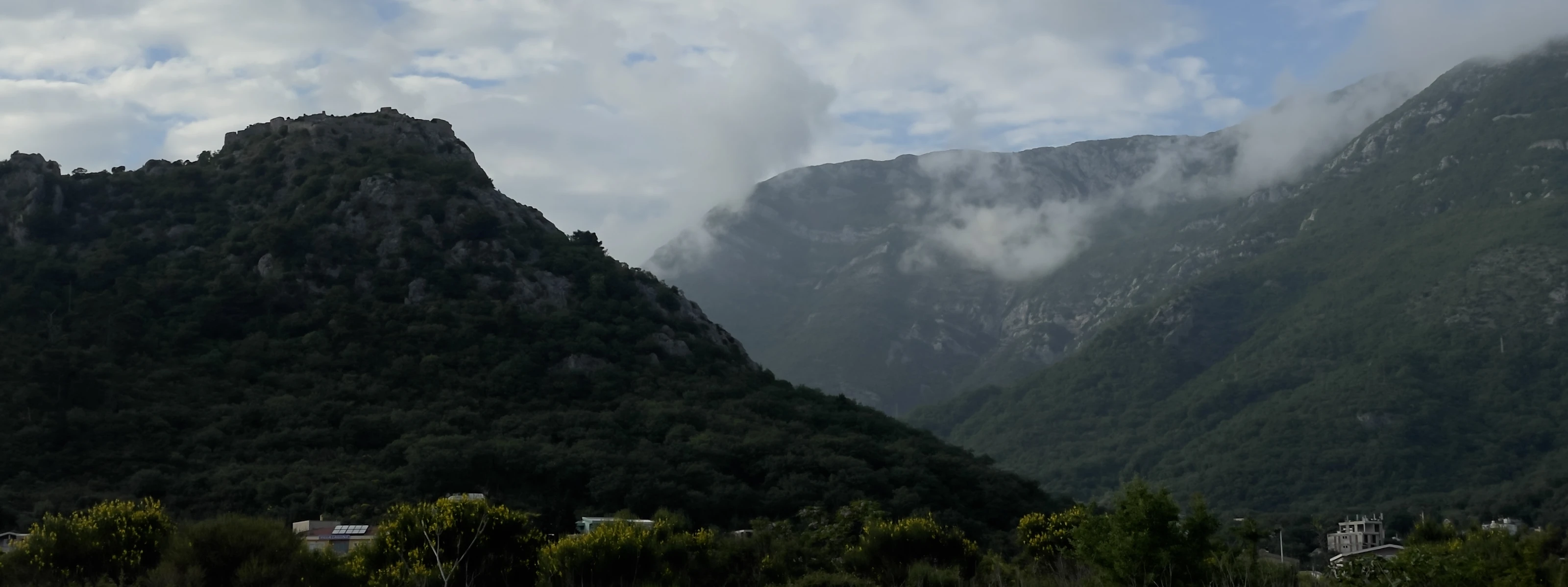Clouds over the mountains above Sutomore